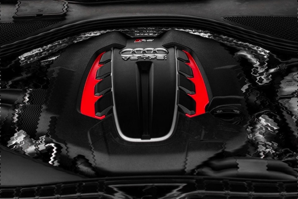 motor auto color negro marcas rojas